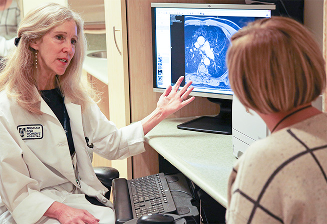 Louise I. Schneider, MD, a member of the Cancer Diagnostic Service team, discusses next steps with a patient.