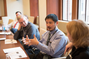 Dr. Suzuki presenting during Bridge Clinic planning meeting