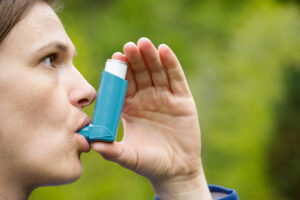 Person using inhaler